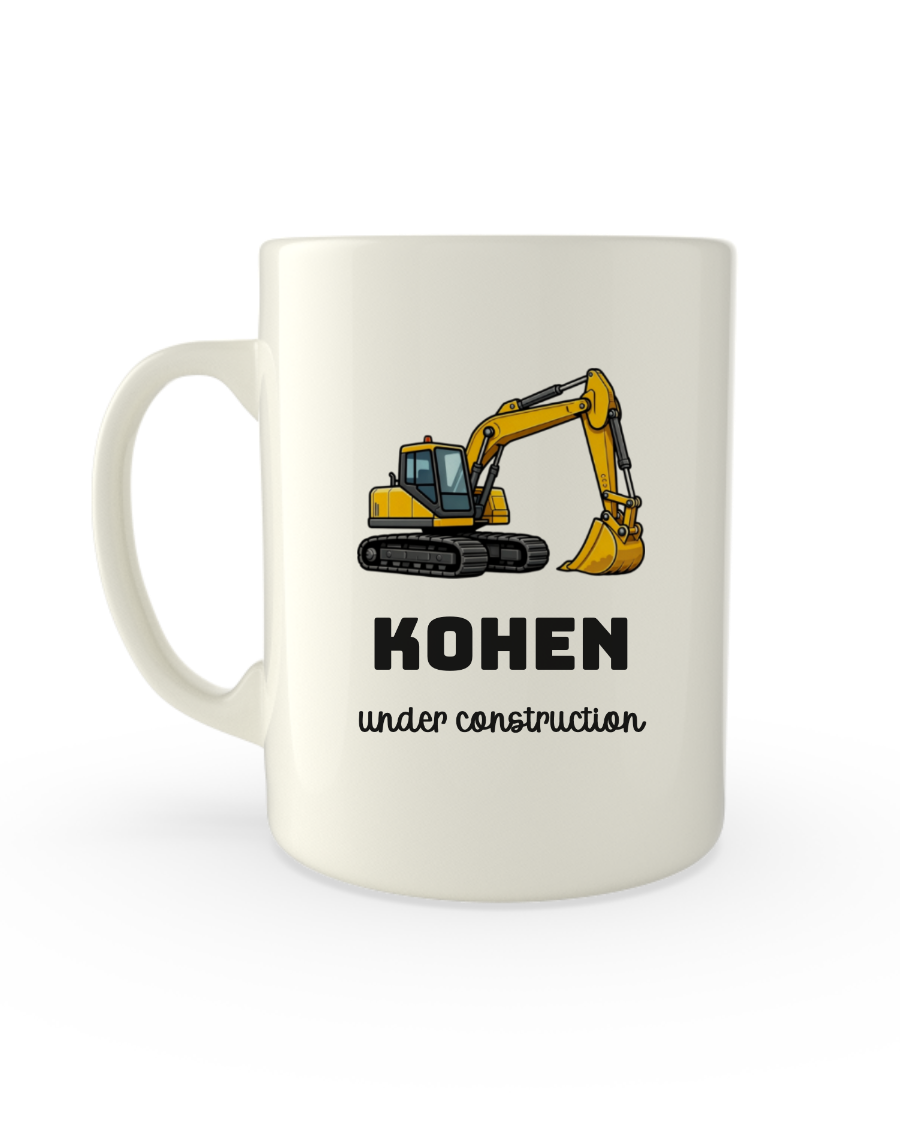 White mug printed with a digger above a child's name